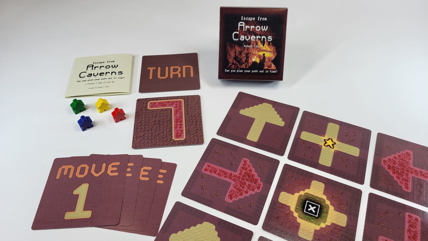 The Escape from Arrow Caverns board game, set up and ready to play